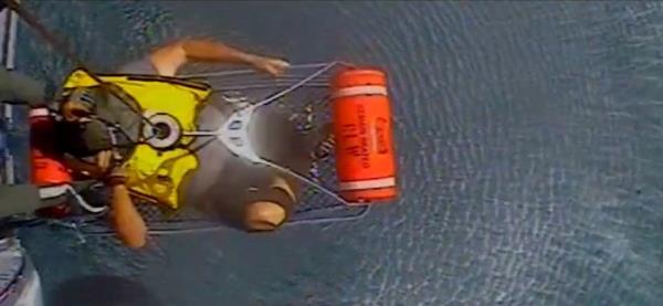 Stranded boater hoisted to safety.